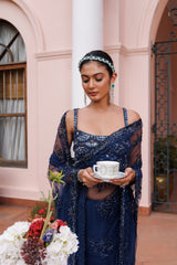 Exquisite Navy blue saree with sparkling floral details and intricate beadwork.