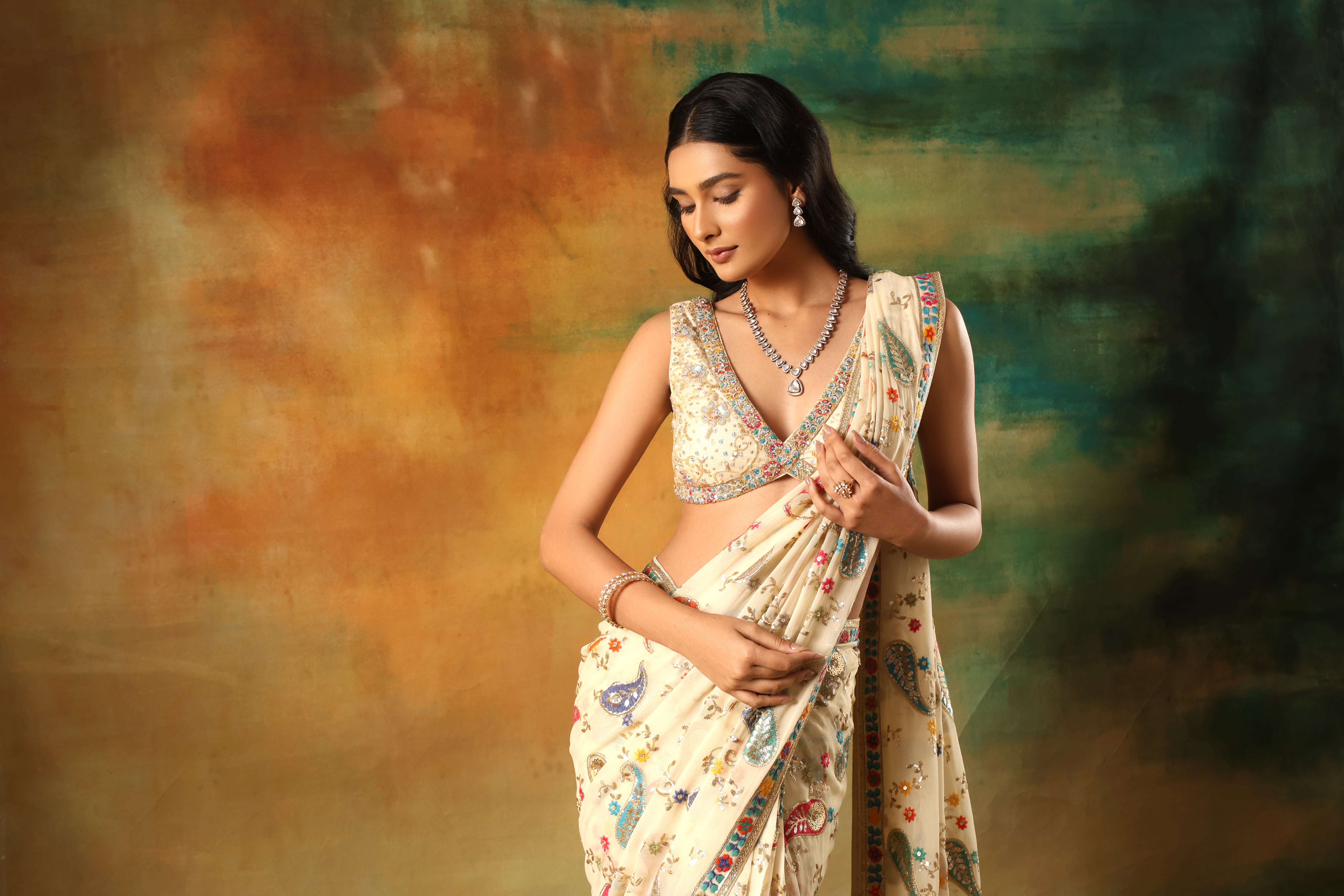 Ivory Embroidered Saree & Embellished Blouse