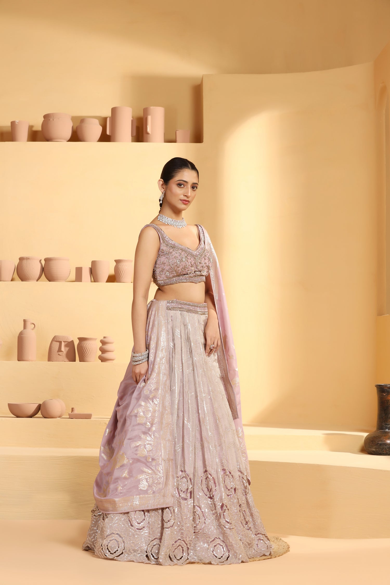 Nakshi and sequin work choli with a cutwork Tissue Lehenga