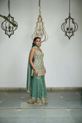 Sage green tissue with sequin, bead, resham & moti nature inspired embellishments.