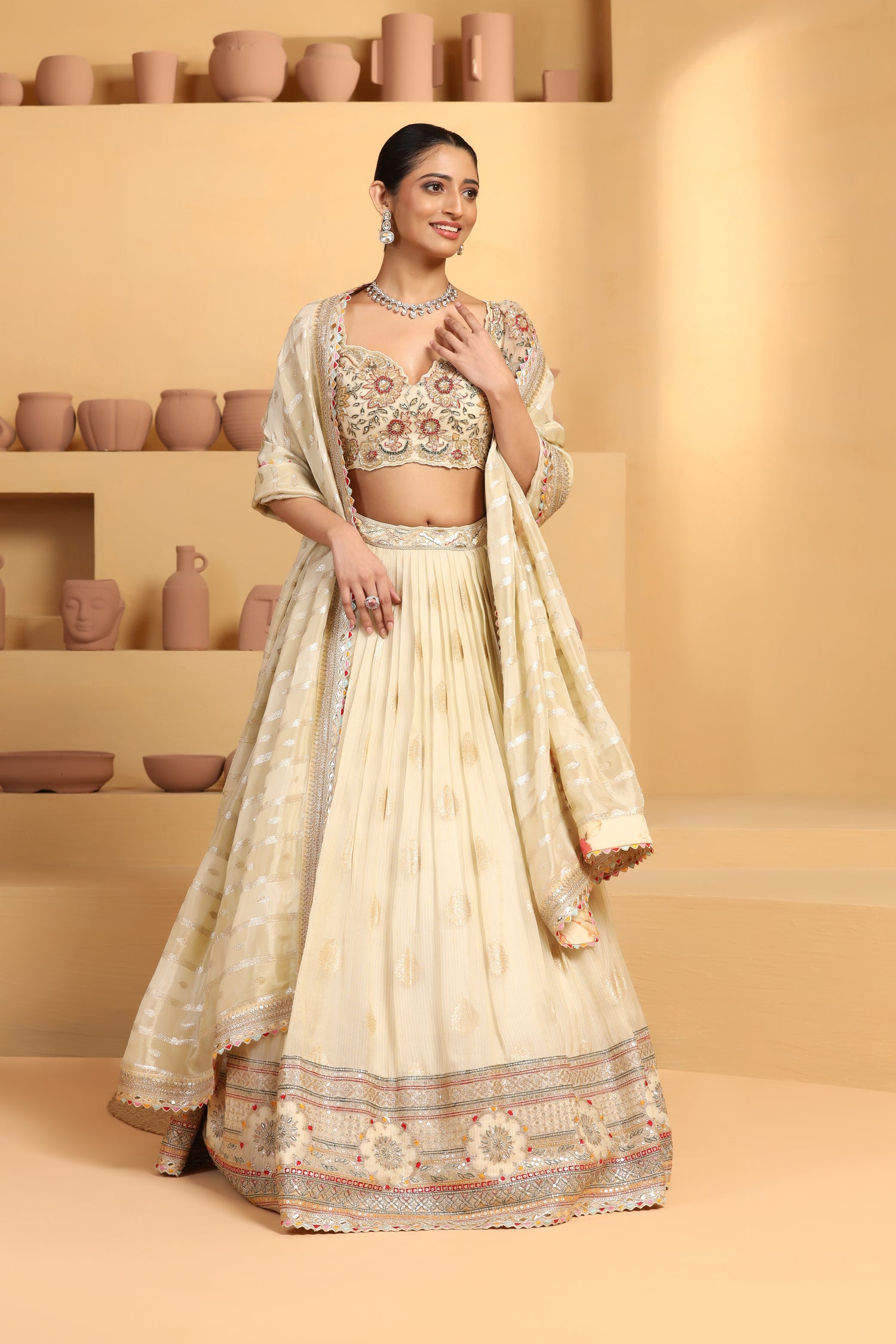 Nakshi, sequin cutdana resham mixed hand crafted choli plus Tissue jacquard lehenga with border