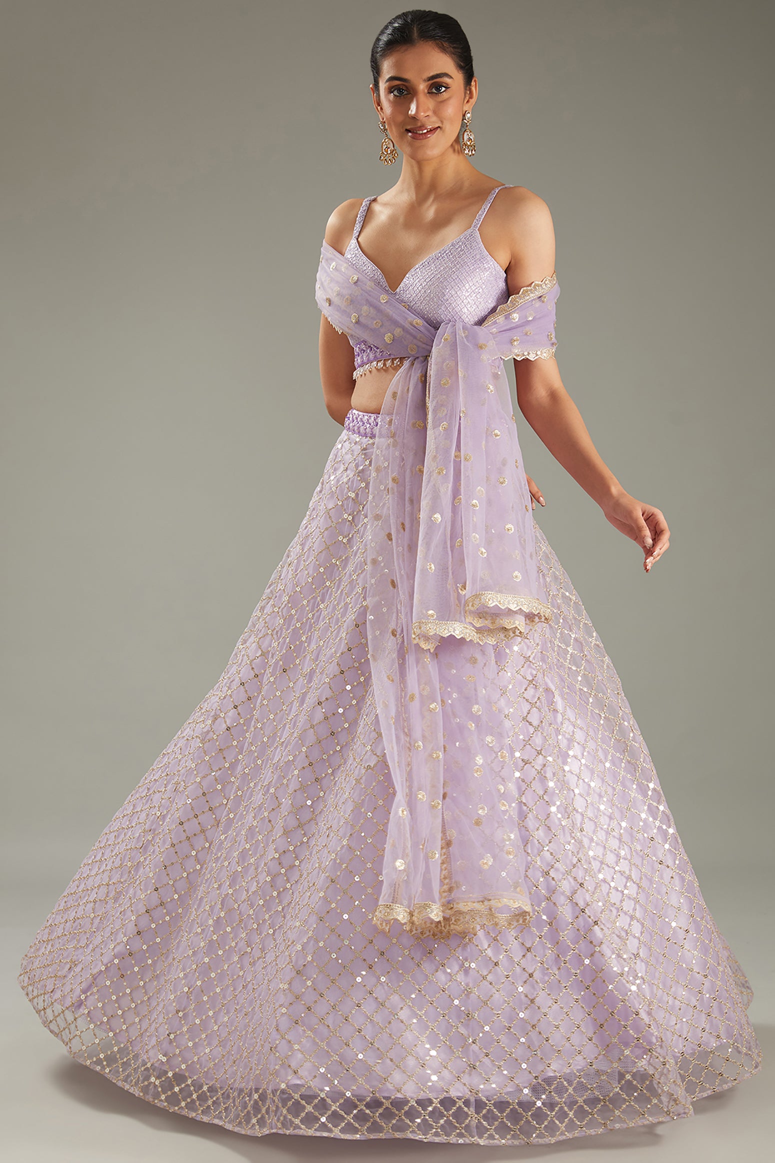 Mauve Net Zari Embroidered Lehenga Set